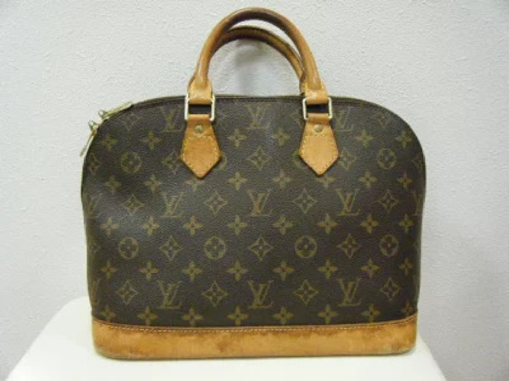 Louis Vuitton Alma Monogram Handbag
